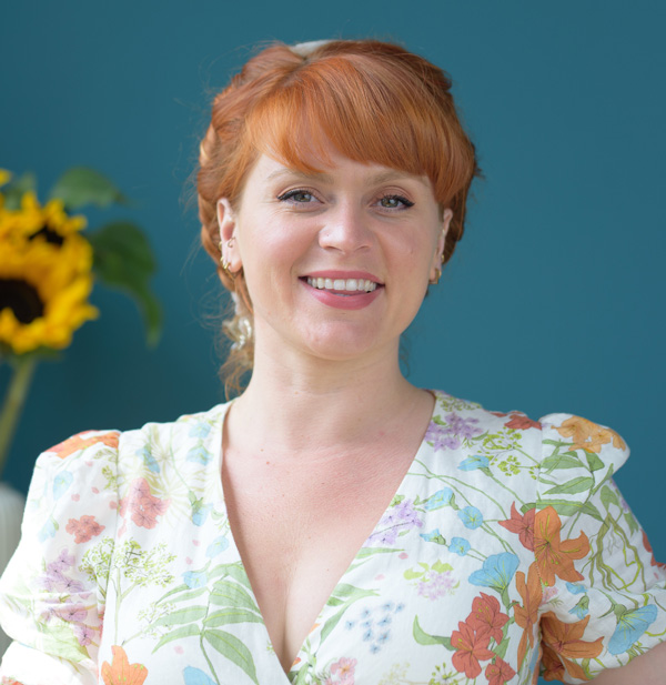 Amy Guerrier Wholehearted AF Headshot with Sunflowers